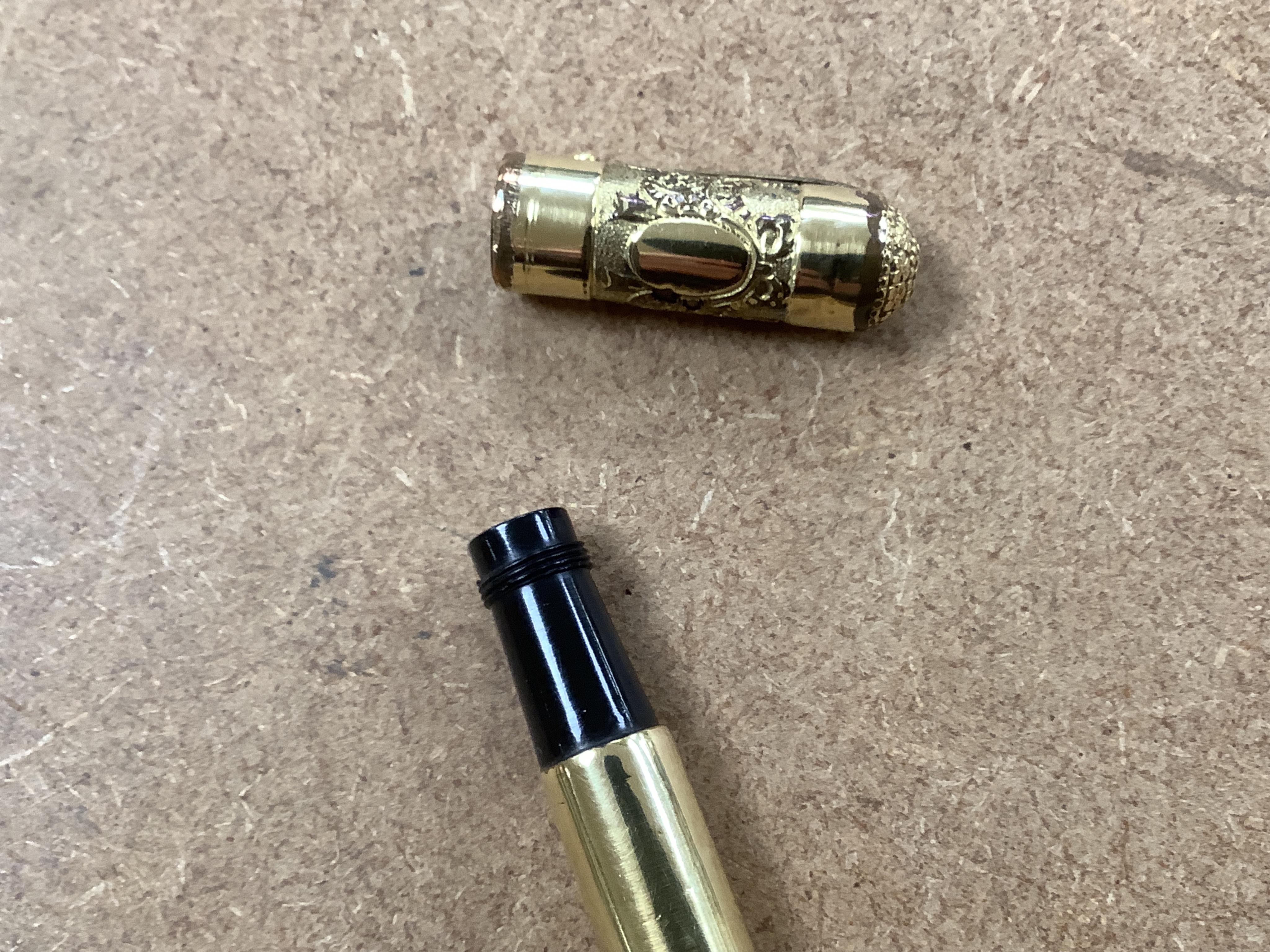 A Waterman No.42 'continental' safety with un unusual highly decorated cap top depicting female faces